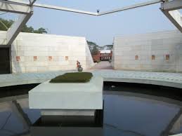 Mausoleum of Ziaur Rahman at Chandrima Uddan, Dhaka: white marble tomb and reflecting pool under an open geometric canopy.