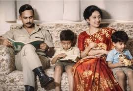 Color family scene on a sofa: Ziaur Rahman reading with children; Khaleda Zia beside them.